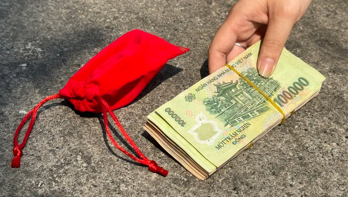 nằm mơ thấy nhặt được tiền